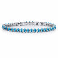 JeenMata 5.5 Carat December Blue Topaz - Oval Cut Birthstone Tennis Bracelet Eternity Design - White Gold Plating, Female, Adult