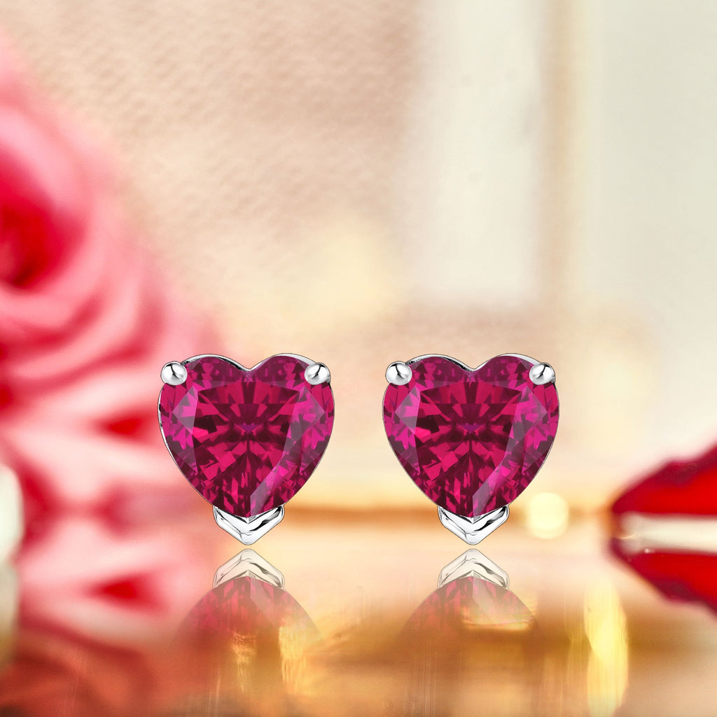 Gorgeous 1 Carat Heart Cut - Ruby - July Birthstone Solitaire Stud Earrings in 18K White Gold Plating over Silver