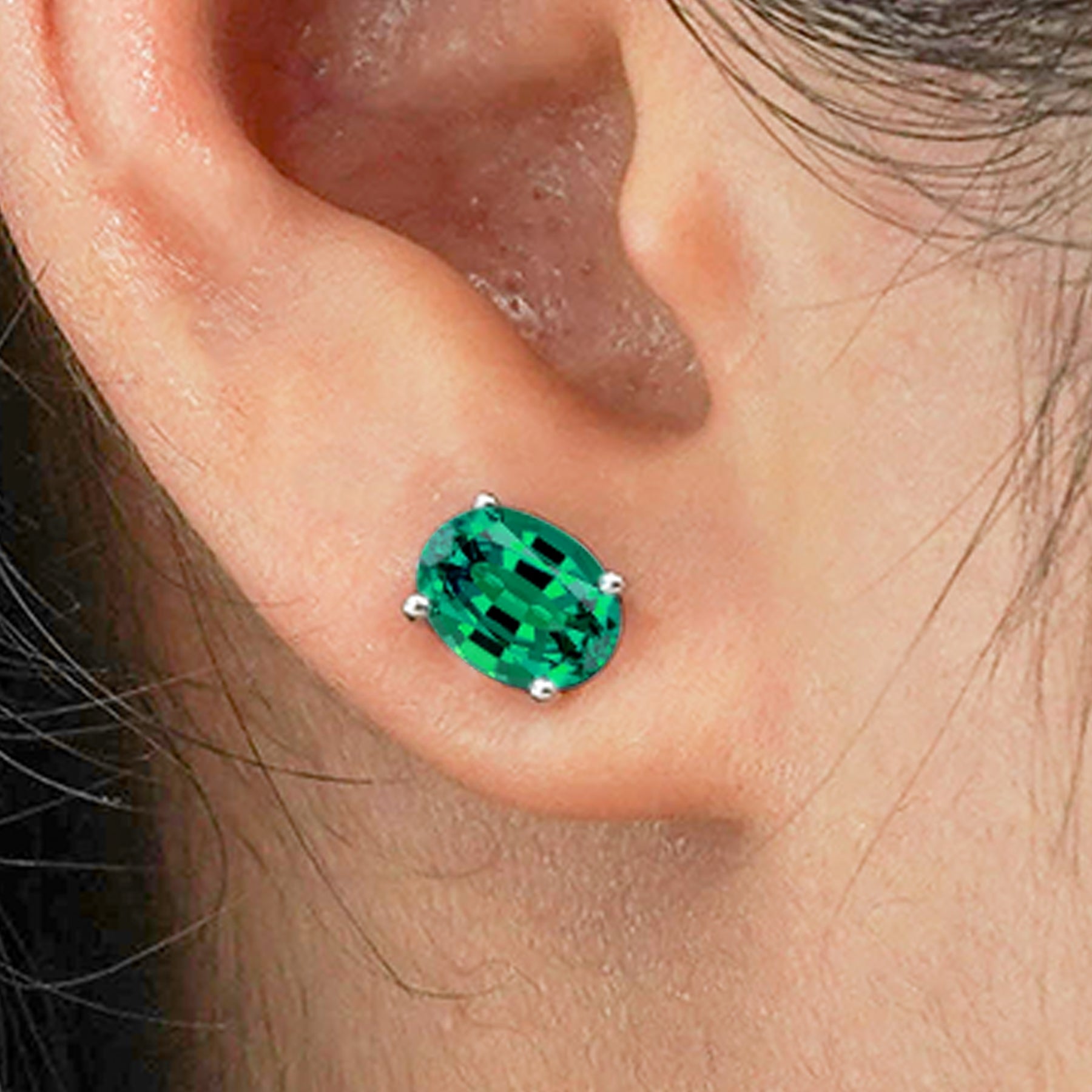 2.5 Carat Oval Cut - SWAROVSKI Emerald - May Birthstone Solitaire Stud Earrings - 4 Prong - In 18K White Gold Plating Over Silver