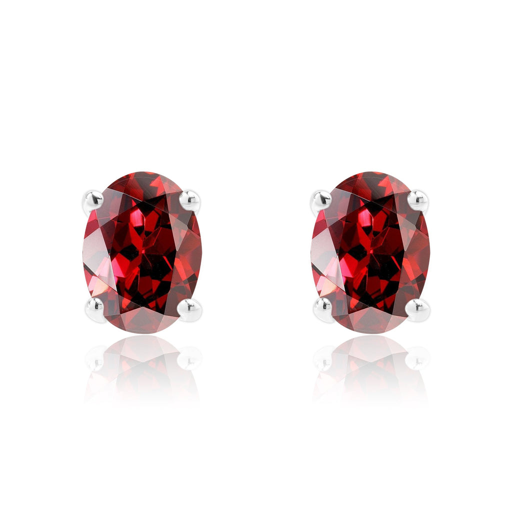 2.5 Carat Oval Cut - SWAROVSKI Garnet - January Birthstone Solitaire Stud Earrings - 4 Prong - In 18K White Gold Plating Over Silver