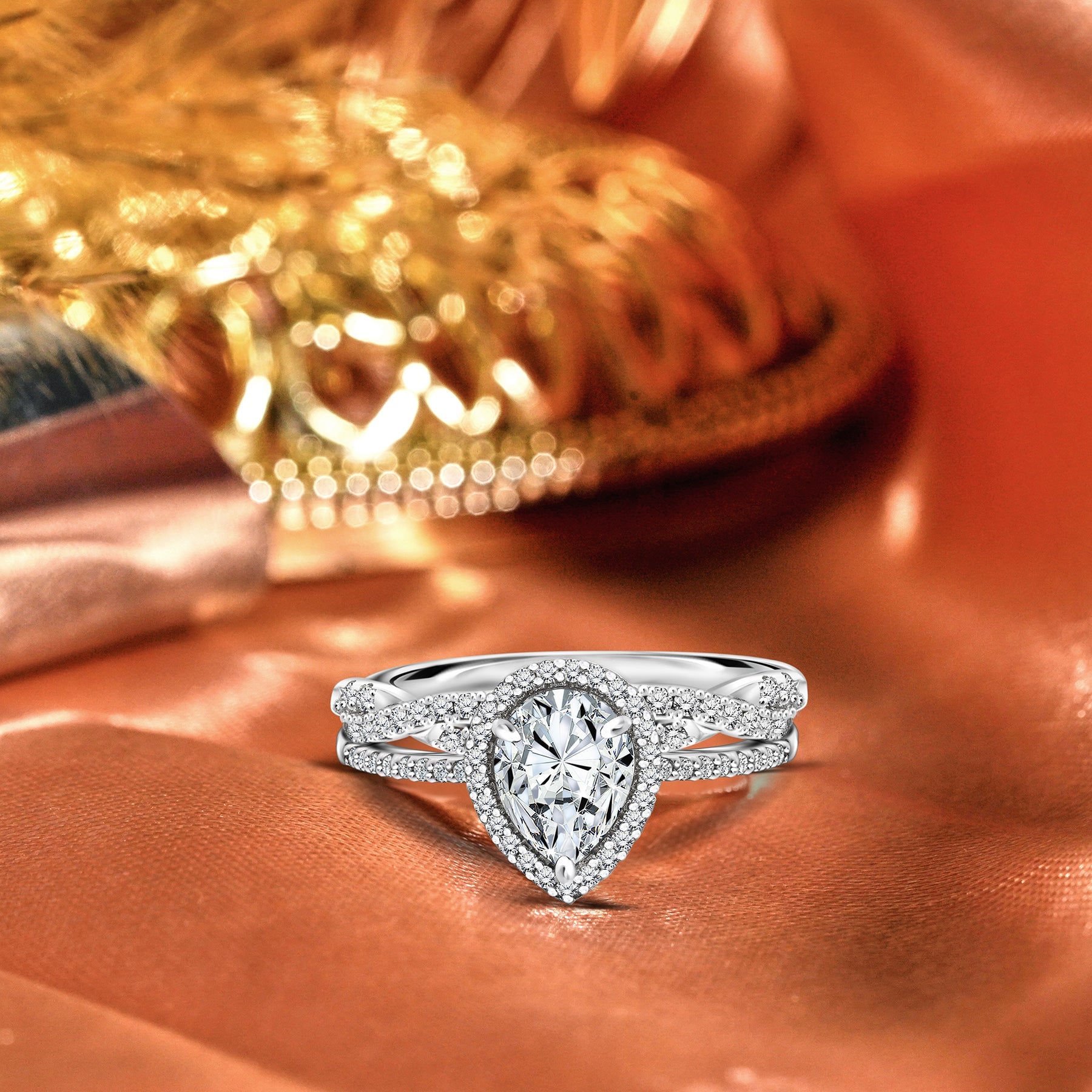 1.25 Carat Pear Cut Moissanite Twisted Wedding Ring Set