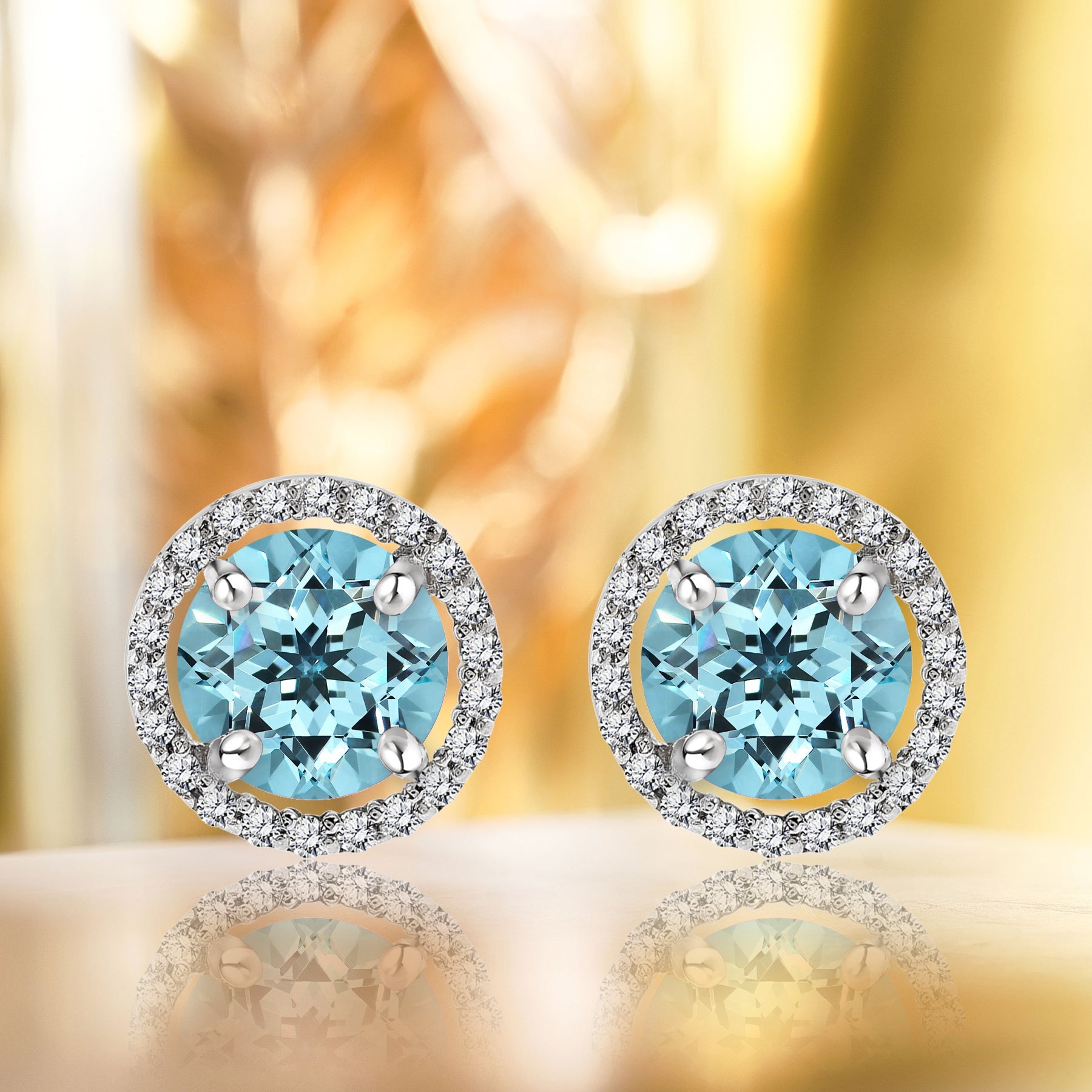 1.25 Carat Round Cut SWAROVSKI Blue Topaz December Birthstone Halo Stud Earrings in 18K White Gold over Silver
