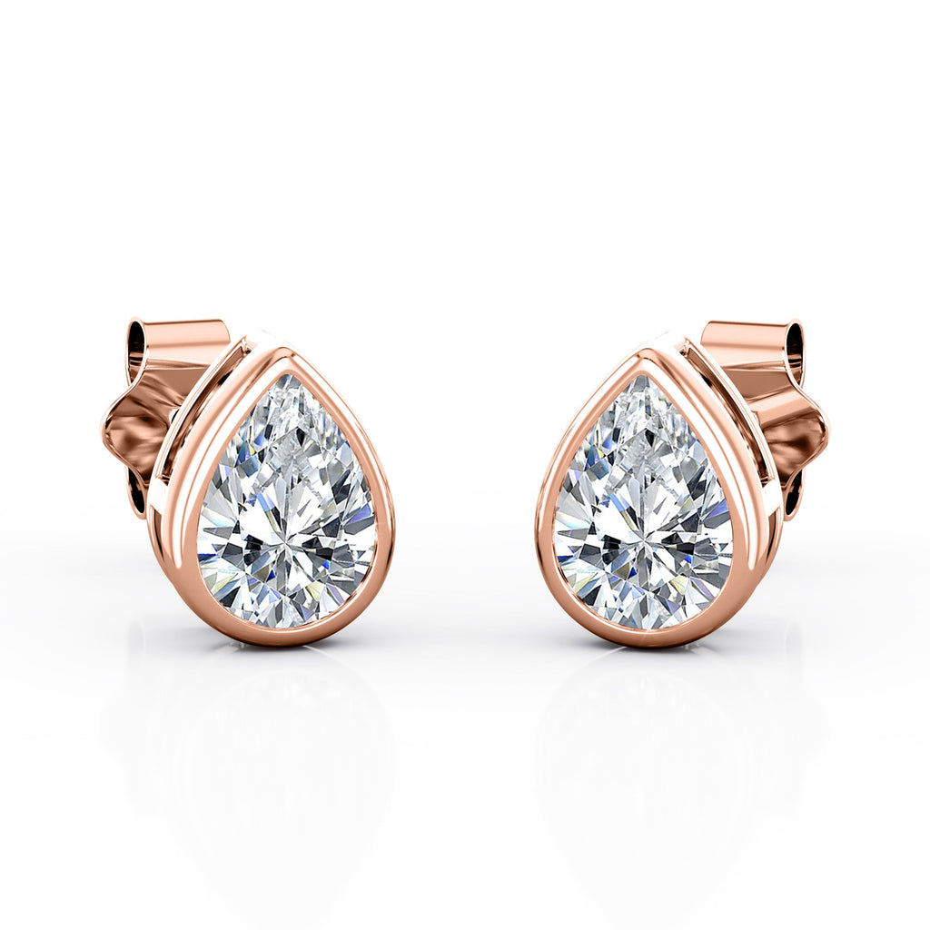 JeenMata Bezel Set 1 Carat Pear Shaped Moissanite Solitaire Stud Earrings In 18K White Gold Plating Over Silver