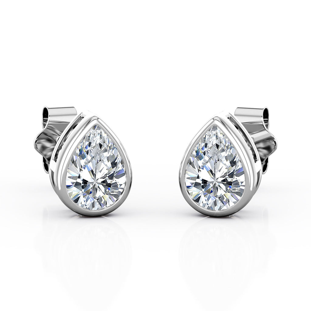 JeenMata Bezel Set 2 Carat Pear Shaped Moissanite Solitaire Stud Earrings In 18K White Gold Plating Over Silver