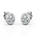 JeenMata Bezel Set 2 Carat Oval Shaped Moissanite Solitaire Stud Earrings In 18K White Gold Plating Over Silver