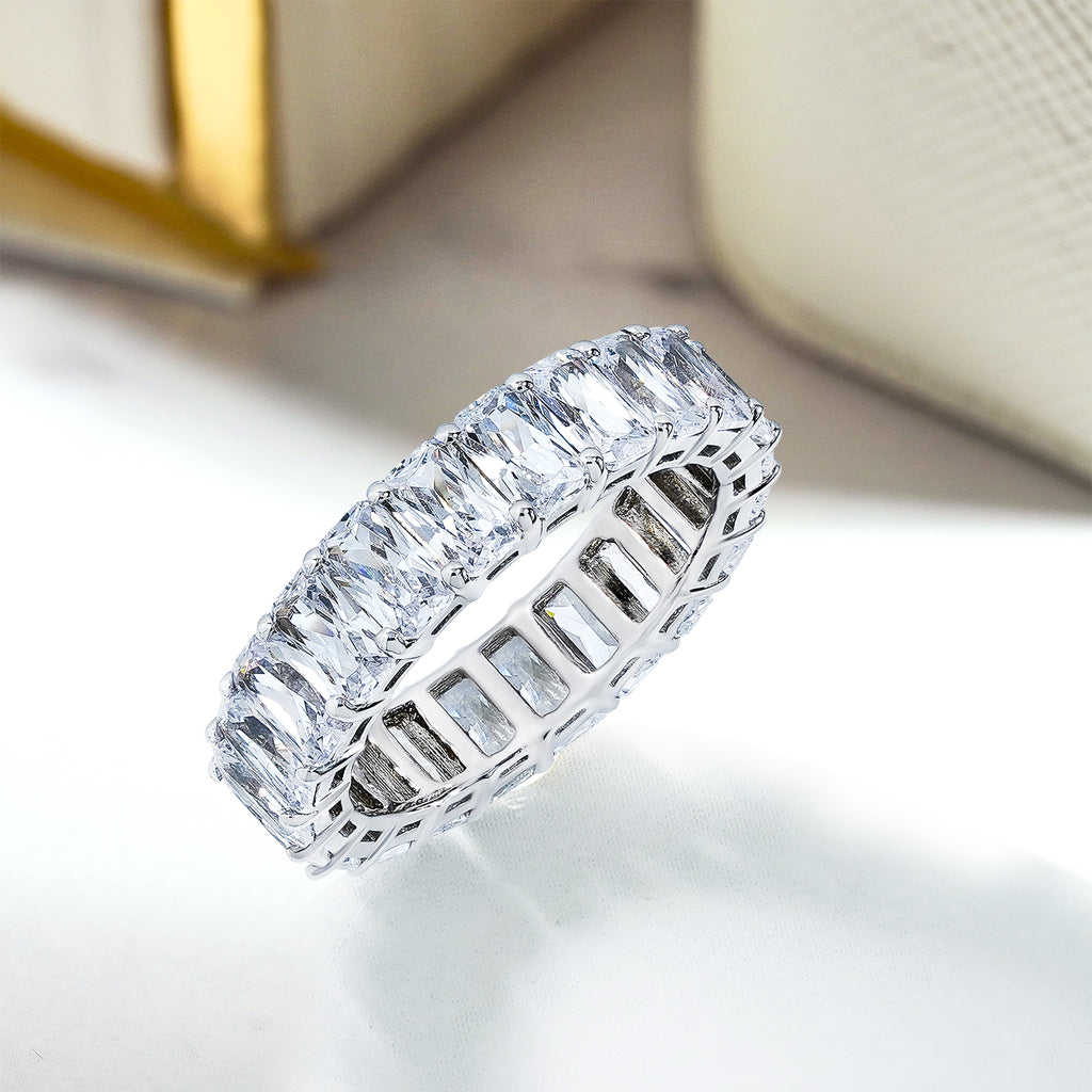 JeenMata 6.75 Carat Emerald Cut Moissanite Eternity Wedding Band - Classic Prong Style Wedding Ring in White Gold Plating for Women