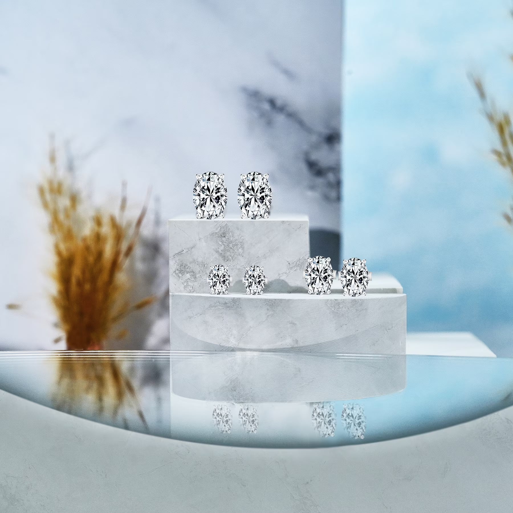 JeenMata 1 Carat Oval Cut Moissanite Solitaire Stud Earrings - 4 Prong - 18K White Gold Plating Over Silver
