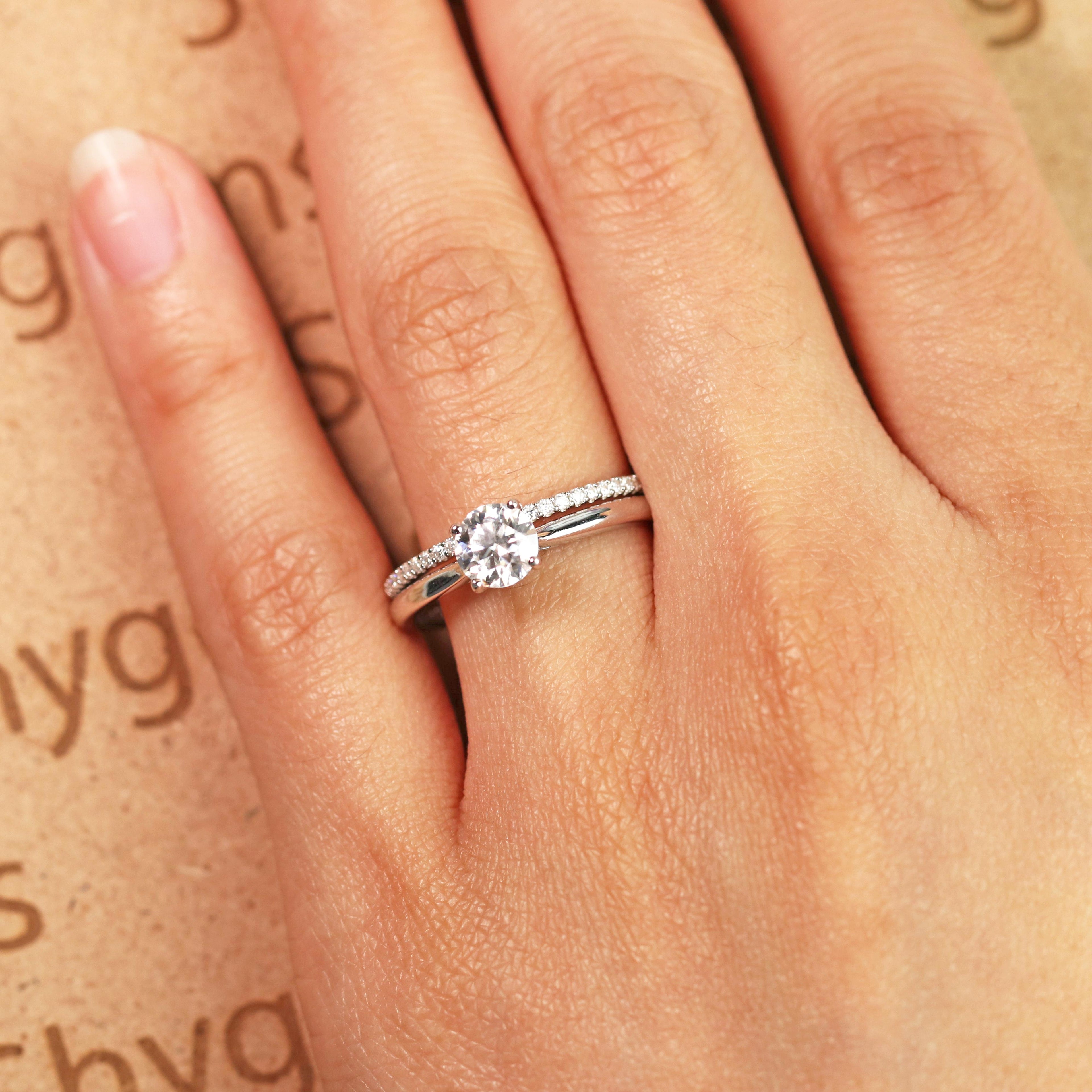 Four Prong 1.25 Carat Round Cut Moissanite Bridal Set