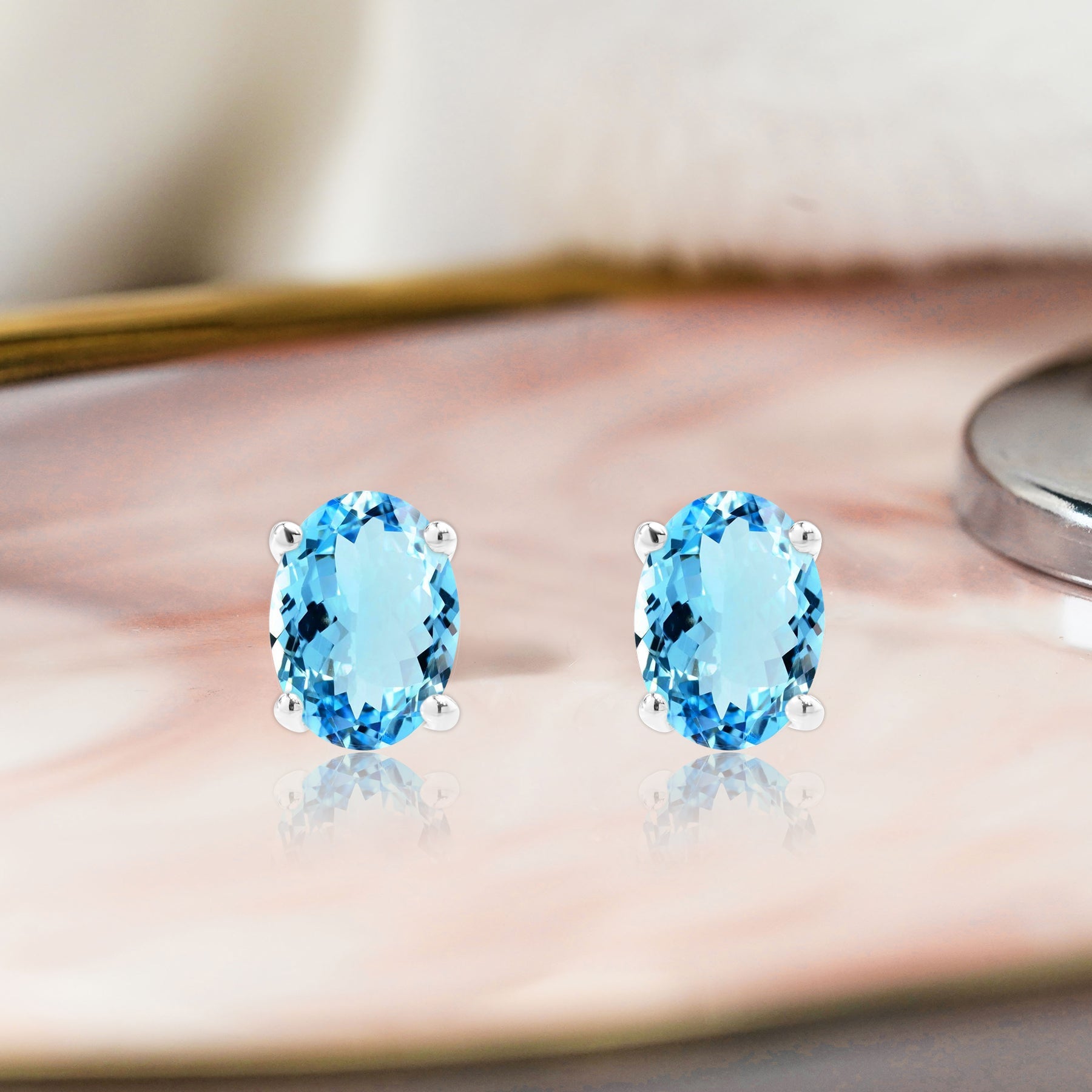 2.5 Carat Oval Cut - SWAROVSKI Blue Topaz - December Birthstone Solitaire Stud Earrings - 4 Prong - In 18K White Gold Plating Over Silver