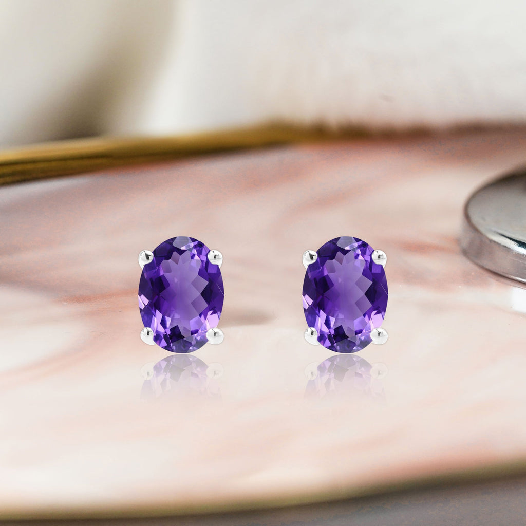 2.5 Carat Oval Cut - SWAROVSKI Amethyst - February Birthstone Solitaire Stud Earrings - 4 Prong - In 18K White Gold Plating Over Silver
