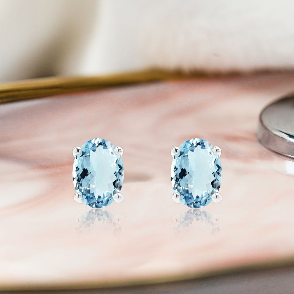 2.5 Carat Oval Cut - SWAROVSKI Aquamarine - March Birthstone Solitaire Stud Earrings - 4 Prong - In 18K White Gold Plating Over Silver