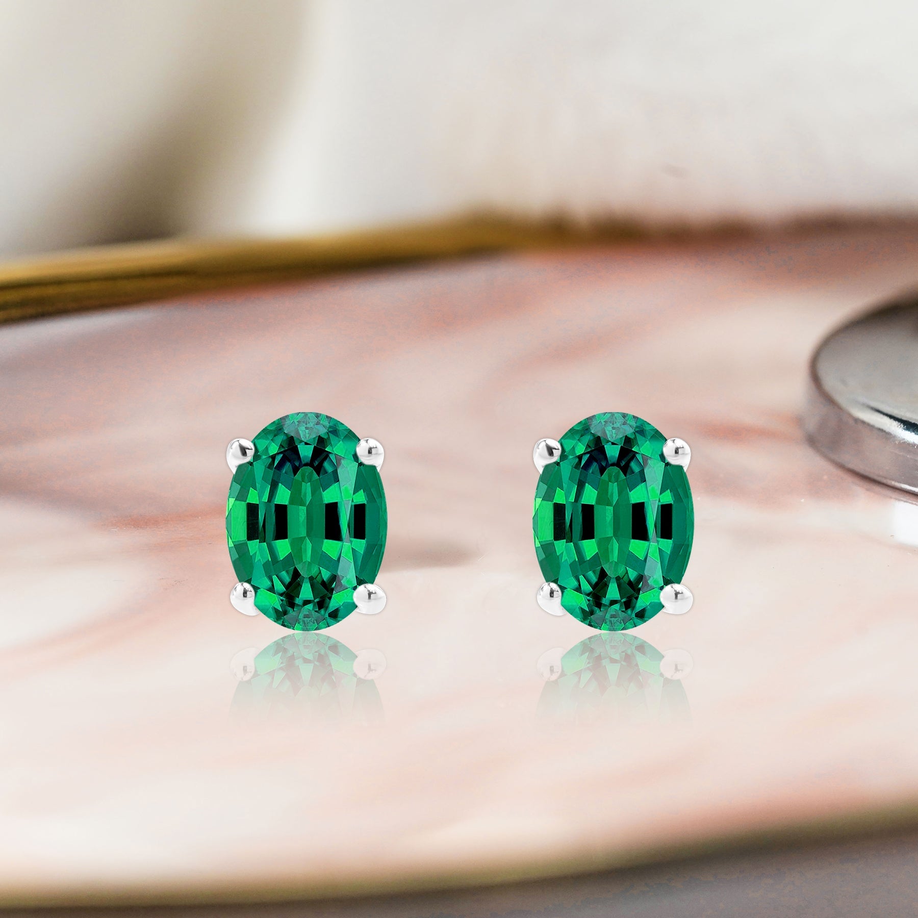 2.5 Carat Oval Cut - SWAROVSKI Emerald - May Birthstone Solitaire Stud Earrings - 4 Prong - In 18K White Gold Plating Over Silver