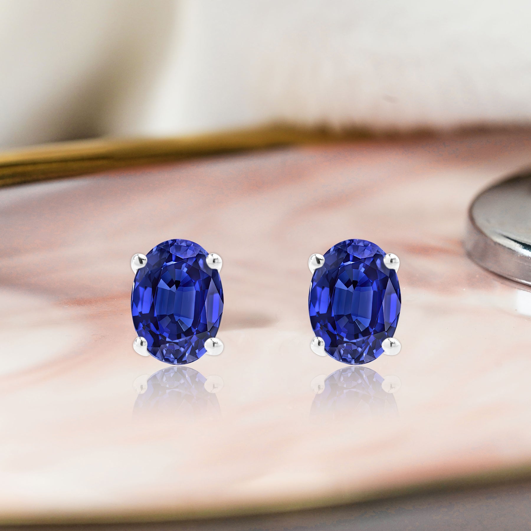 2.5 Carat Oval Cut - SWAROVSKI Blue Sapphire - September Birthstone Solitaire Stud Earrings - 4 Prong - In 18K White Gold Plating Over Silver