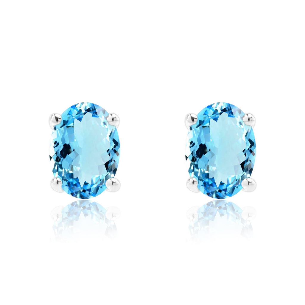 2.5 Carat Oval Cut - SWAROVSKI Blue Topaz - December Birthstone Solitaire Stud Earrings - 4 Prong - In 18K White Gold Plating Over Silver