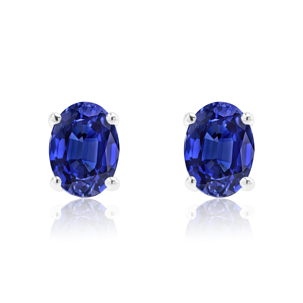 2.5 Carat Oval Cut - SWAROVSKI Blue Sapphire - September Birthstone Solitaire Stud Earrings - 4 Prong - In 18K White Gold Plating Over Silver