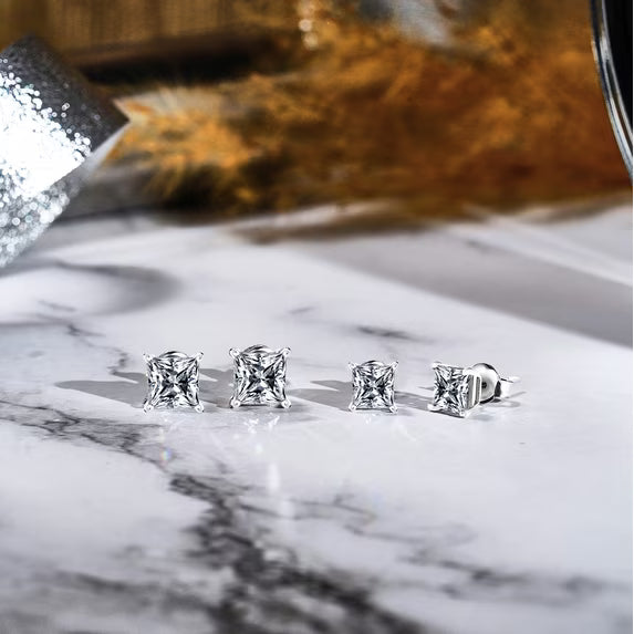 JeenMata 2 Carat Princess Cut Moissanite 4 Prong Solitaire Stud Earrings In 18K White Gold Plating Over Silver