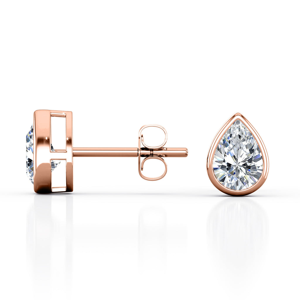 JeenMata Bezel Set 1 Carat Pear Shaped Moissanite Solitaire Stud Earrings In 18K White Gold Plating Over Silver