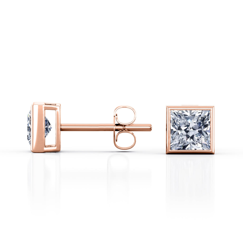 JeenMata Bezel Set 1 Carat Princess Shaped Moissanite Solitaire Stud Earrings In 18K White Gold Plating Over Silver