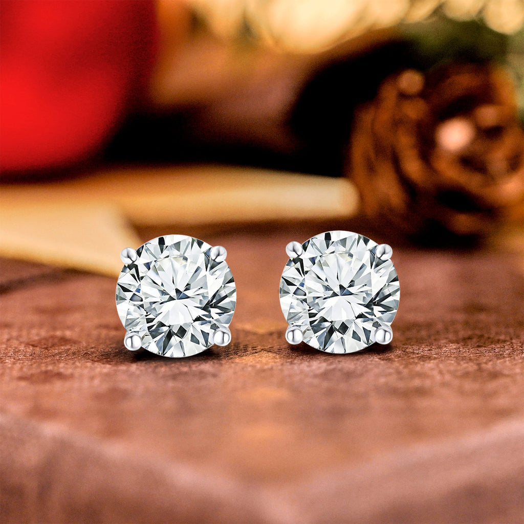4 Prong 4 Carat Round Shaped Moissanite Solitaire Stud Earrings In 18K White Gold Plating Over Silver
