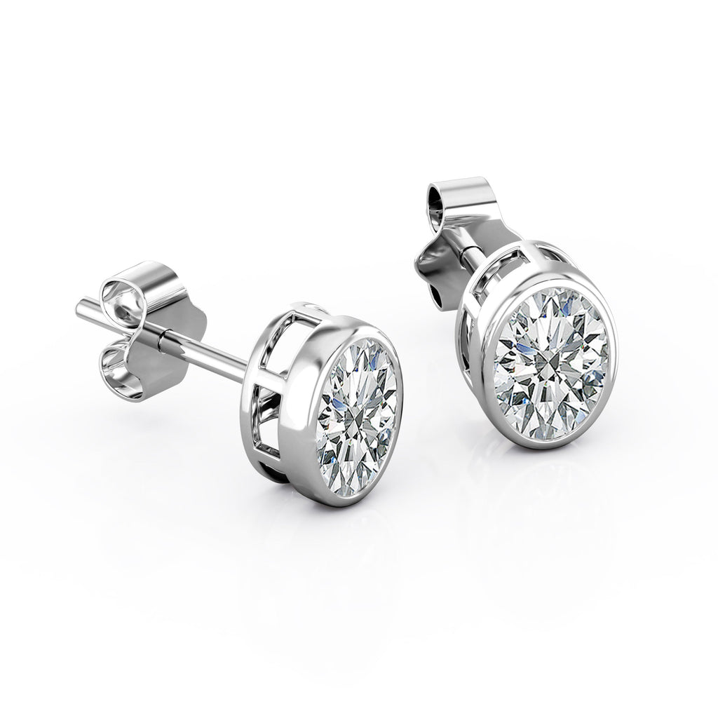 JeenMata Bezel Set 1 Carat Oval Shaped Moissanite Solitaire Stud Earrings In 18K White Gold Plating Over Silver