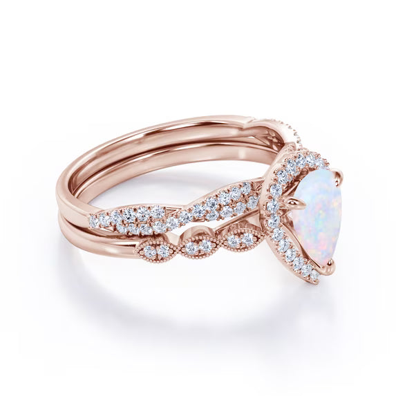 JeenMata 1.5 Carat Pear Cut Lab Created Opal and Moissanite Vintage Engagement Ring - Halo Pave Bridal Set in 18K Rose Gold Plating for Women