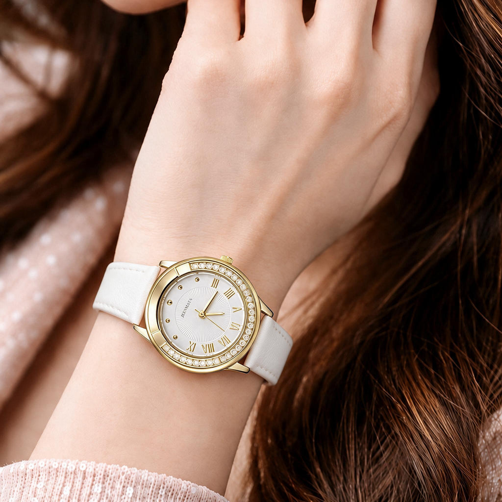 JeenMata Women's Luxe White & Gold Watch - Rhinestone Accent Gold Case, White Roman Numeral Dial, Water Resistant Fashion Strap Watch