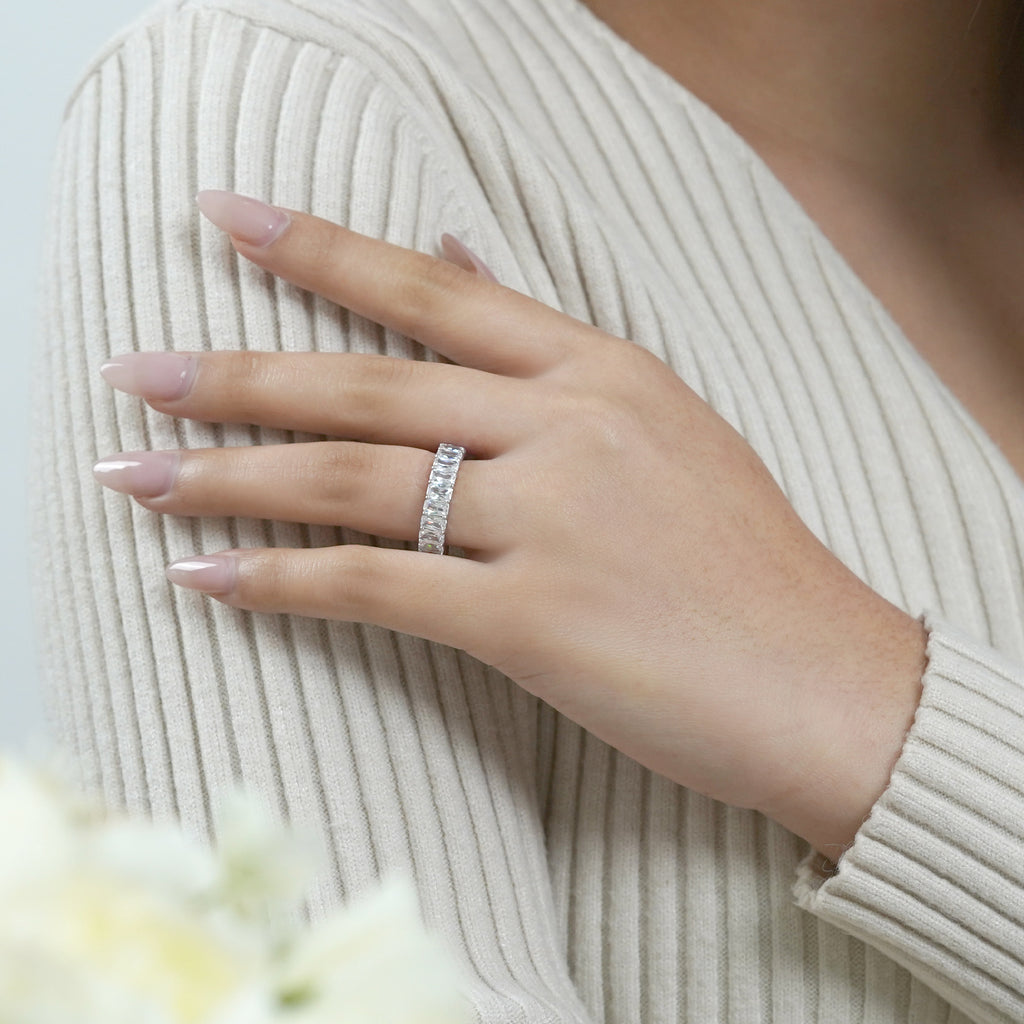 JeenMata 6.75 Carat Emerald Cut Moissanite Eternity Wedding Band - Classic Prong Style Wedding Ring in White Gold Plating for Women