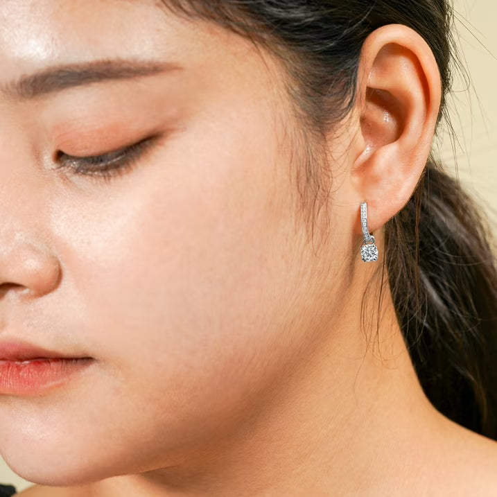 JeenMata 1 Carat Round Cut Lab Grown Diamond Dangle Drop Earrings in 18K White Gold Over Silver