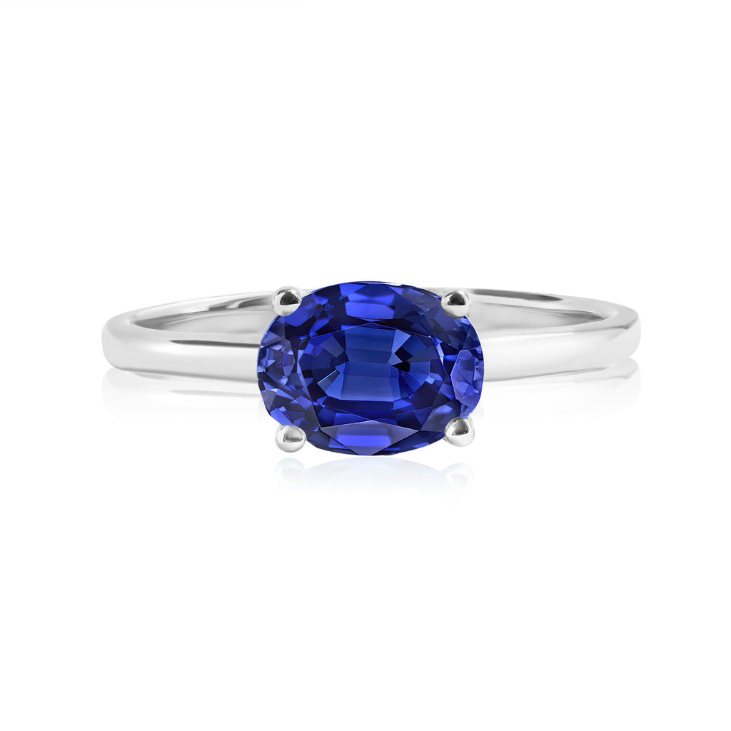 1.25 Carat Oval Cut Blue Sapphire SWAROVSKI - September Birthstone Solitaire Engagement Ring in 18k White Gold Over Silver