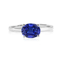 1.25 Carat Oval Cut Blue Sapphire SWAROVSKI - September Birthstone Solitaire Engagement Ring in 18k White Gold Over Silver