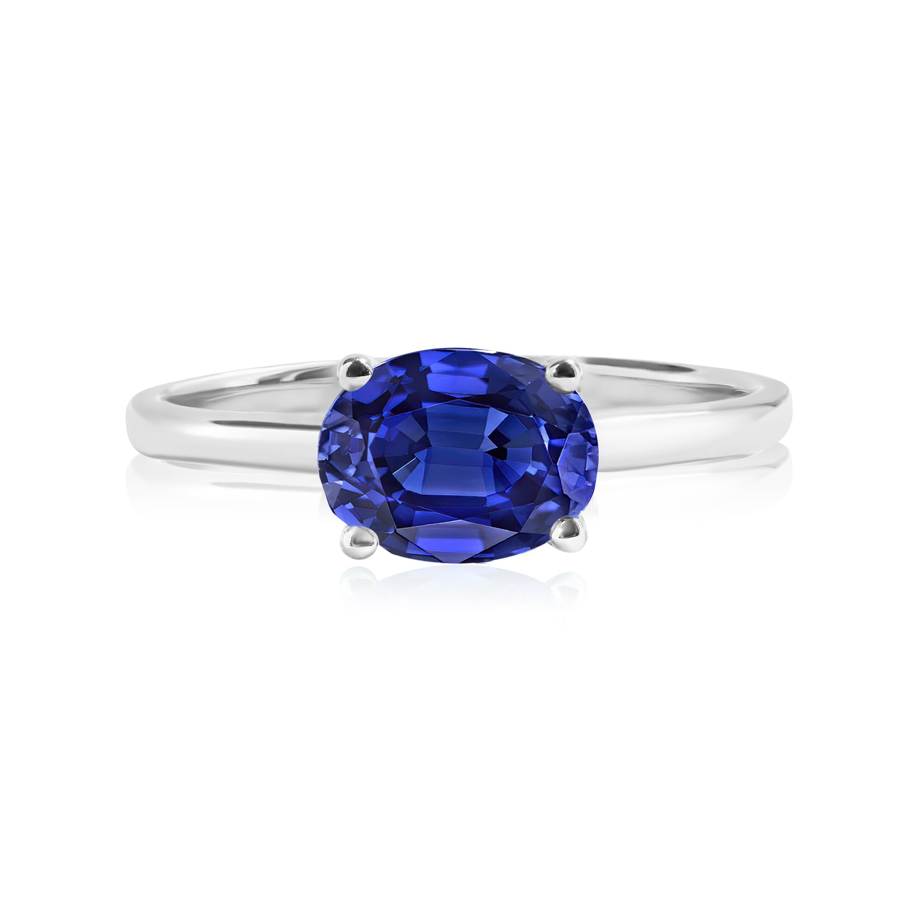 1.25 Carat Oval Cut Blue Sapphire SWAROVSKI - September Birthstone Solitaire Engagement Ring in 18k White Gold Over Silver