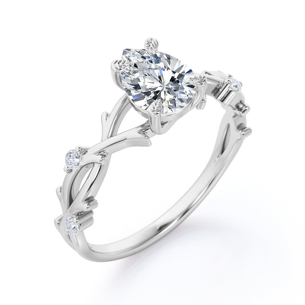 Nature Inspired 0.55 Carat Pear Moissanite Twisted Engagement Ring