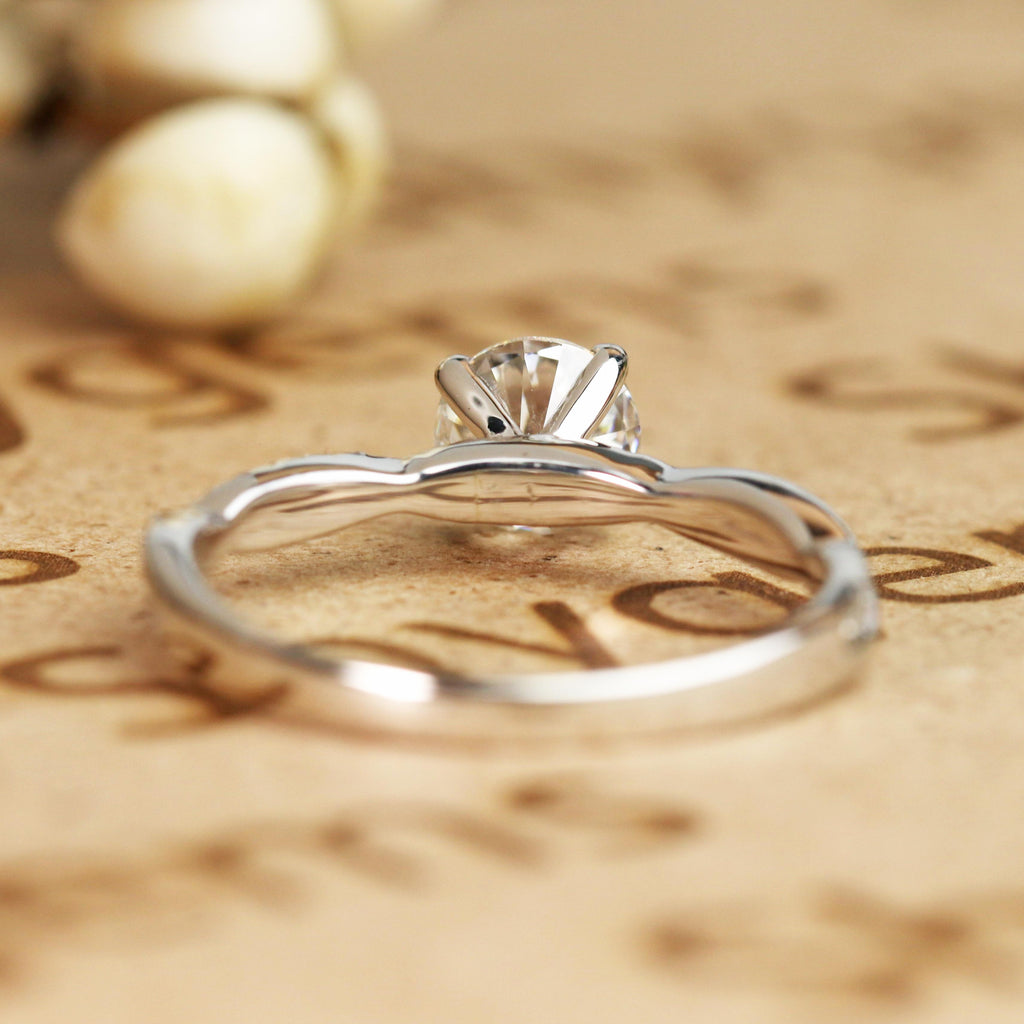 JeenMata Cathedral Prong 1 Carat Round Shaped Moissanite Half Pave Infinity Twisted Shank Engagement Ring In 18K White Gold Plating Over Silver