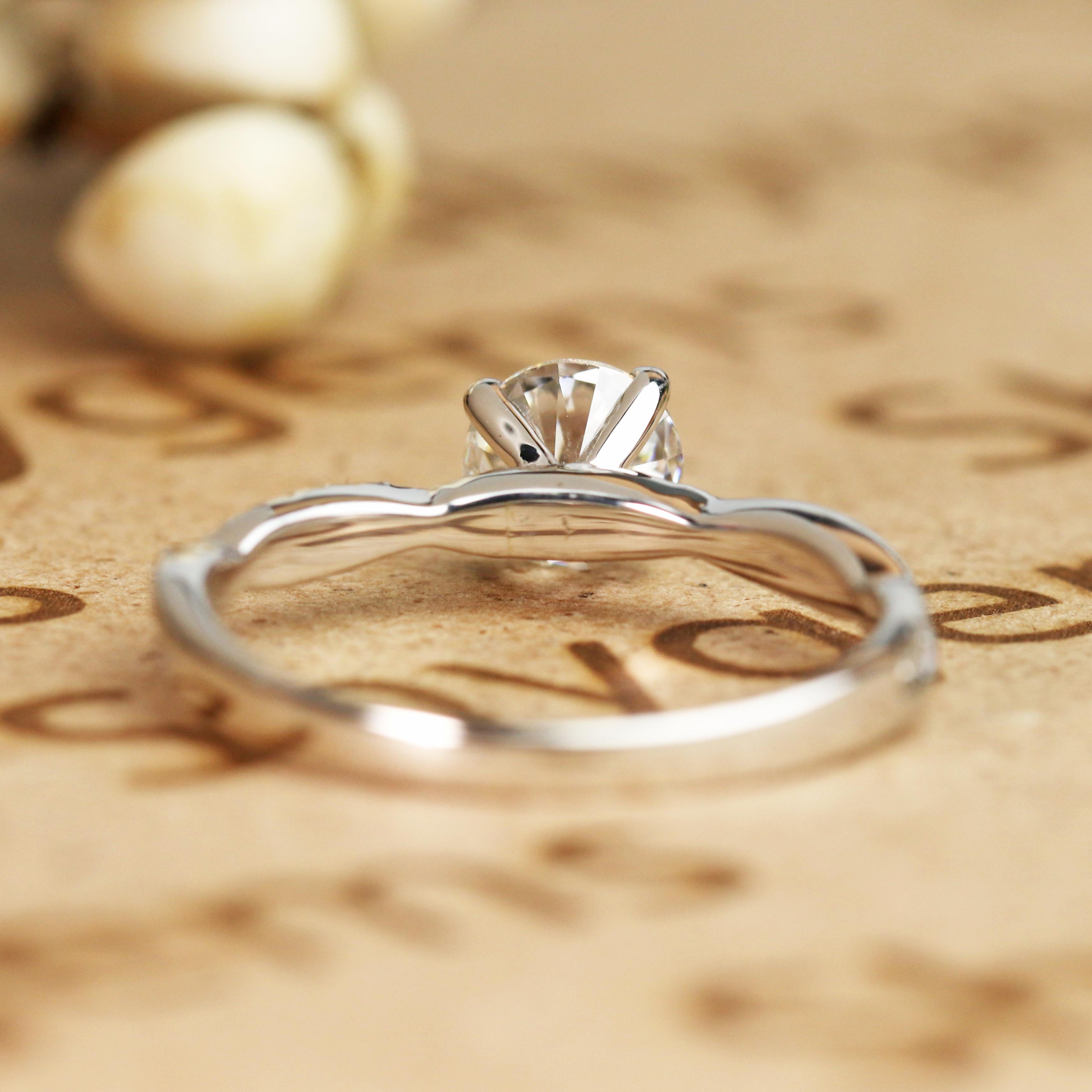 JeenMata Cathedral Prong 1 Carat Round Shaped Moissanite Half Pave Infinity Twisted Shank Engagement Ring In 18K White Gold Plating Over Silver