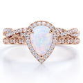 JeenMata 1.5 Carat Pear Cut Lab Created Opal and Moissanite Vintage Engagement Ring - Halo Pave Bridal Set in 18K Rose Gold Plating for Women