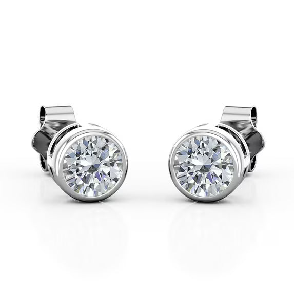 JeenMata Bezel Set 1 Carat Round Shaped Moissanite Solitaire Stud Earrings In 18K White Gold Plating Over Silver