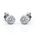 JeenMata Bezel Set 1 Carat Round Shaped Moissanite Solitaire Stud Earrings In 18K White Gold Plating Over Silver
