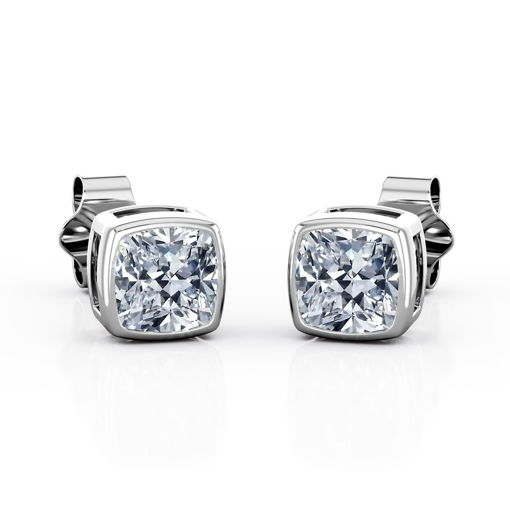JeenMata Bezel Set 2 Carat Cushion Shaped Moissanite Solitaire Stud Earrings In 18K White Gold Plating Over Silver