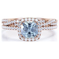 JeenMata Halo Prong Set - 1.50 Carat Cushion Cut Seafoam Created Aquamarine and Moissanite - Pave Twisted Infinity Wedding Ring Set - 18K Rose Gold Plating over Silver