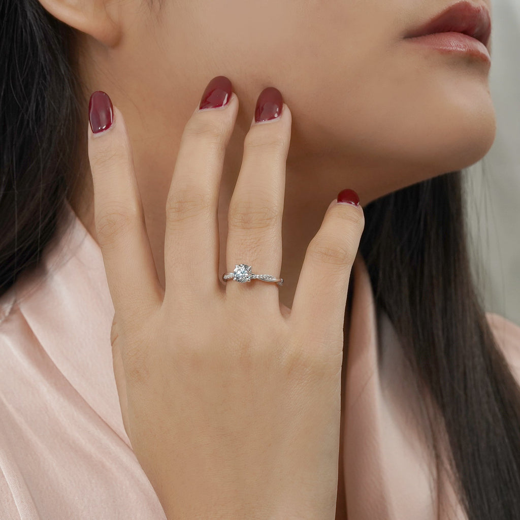 JeenMata Cathedral Prong 1 Carat Round Shaped Moissanite Half Pave Infinity Twisted Shank Engagement Ring In 18K White Gold Plating Over Silver