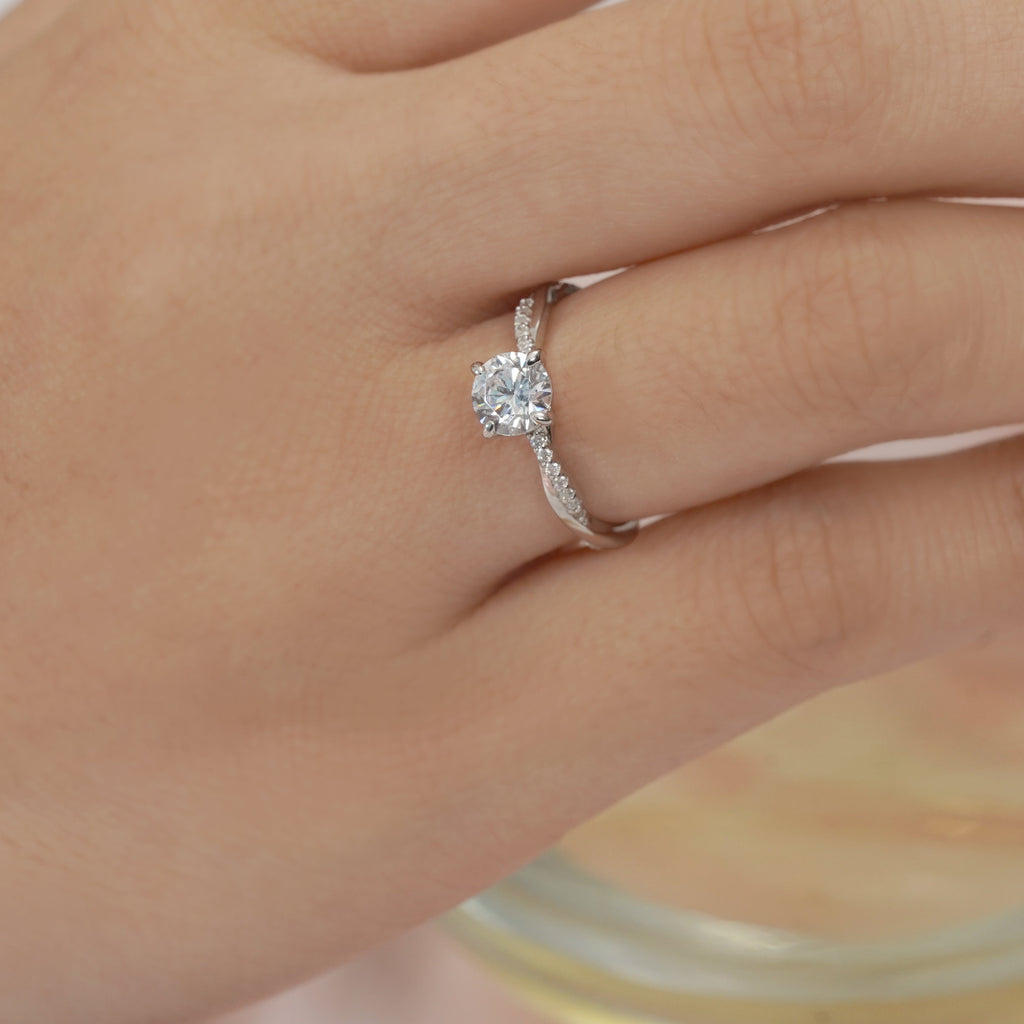 JeenMata Cathedral Prong 1 Carat Round Shaped Moissanite Half Pave Infinity Twisted Shank Engagement Ring In 18K White Gold Plating Over Silver