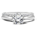 Four Prong 1.25 Carat Round Cut Moissanite Bridal Set