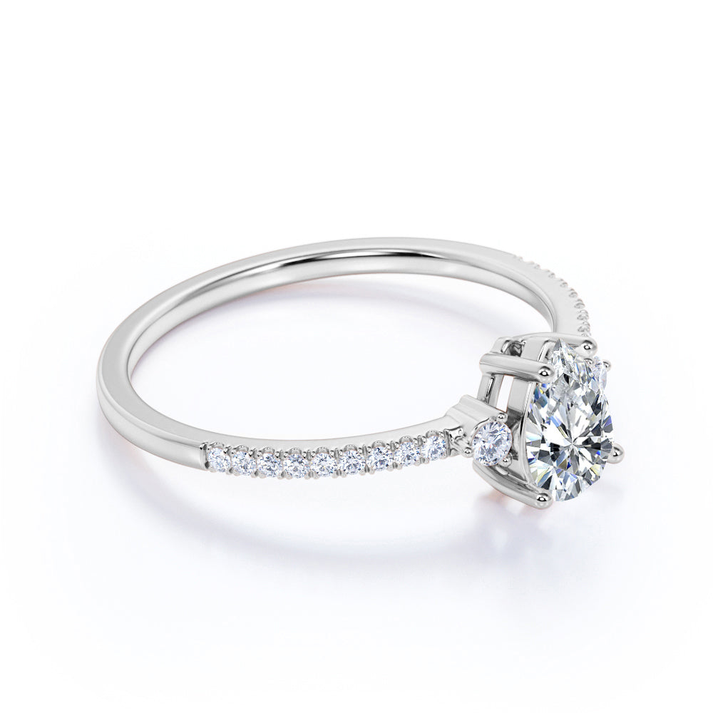 Pave Set 1.50 Carat Pear Moissanite Engagement Ring