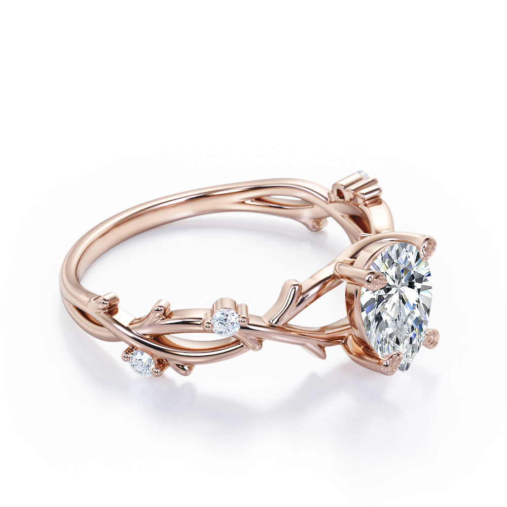 Nature Inspired 0.55 Carat Pear Moissanite Twisted Engagement Ring