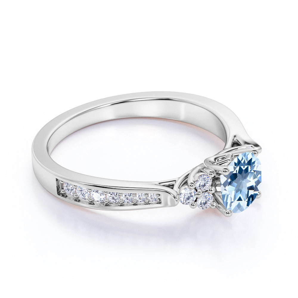 JeenMata 1 carat Round Dark Blue Created Aquamarine Tapered Birthstone Engagement Ring in 18k White Gold over Silver