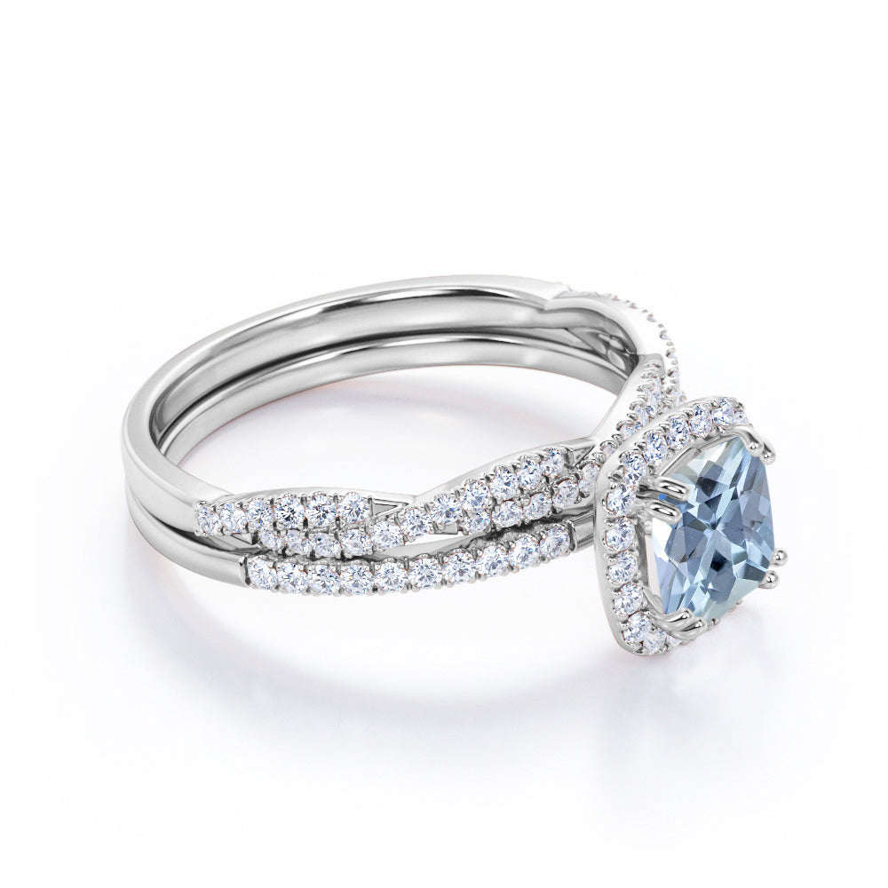 JeenMata Halo Prong Set - 1.5 Carat Cushion Cut Seafoam Created Aquamarine and Moissanite - Pave Twisted Infinity Wedding Ring Set - 18K White Gold Plating over Silver