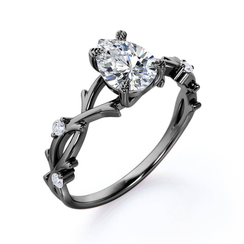 Nature Inspired 0.55 Carat Pear Moissanite Twisted Engagement Ring