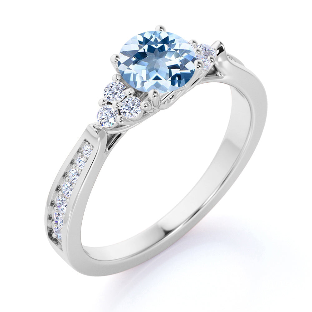 JeenMata 1 carat Round Dark Blue Created Aquamarine Tapered Birthstone Engagement Ring in 18k White Gold over Silver