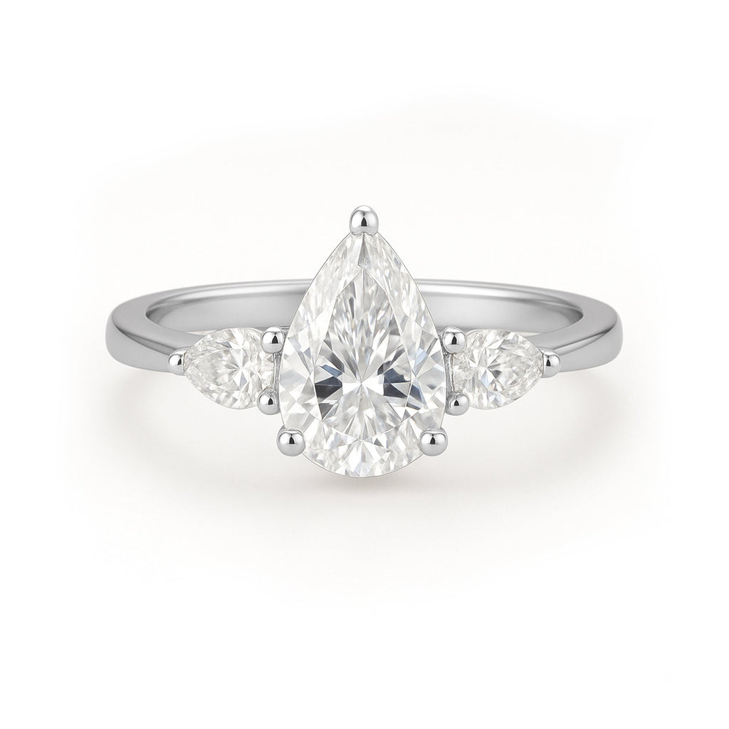 1.10 Ct Pear Moissanite Three-Stone Engagement Ring
