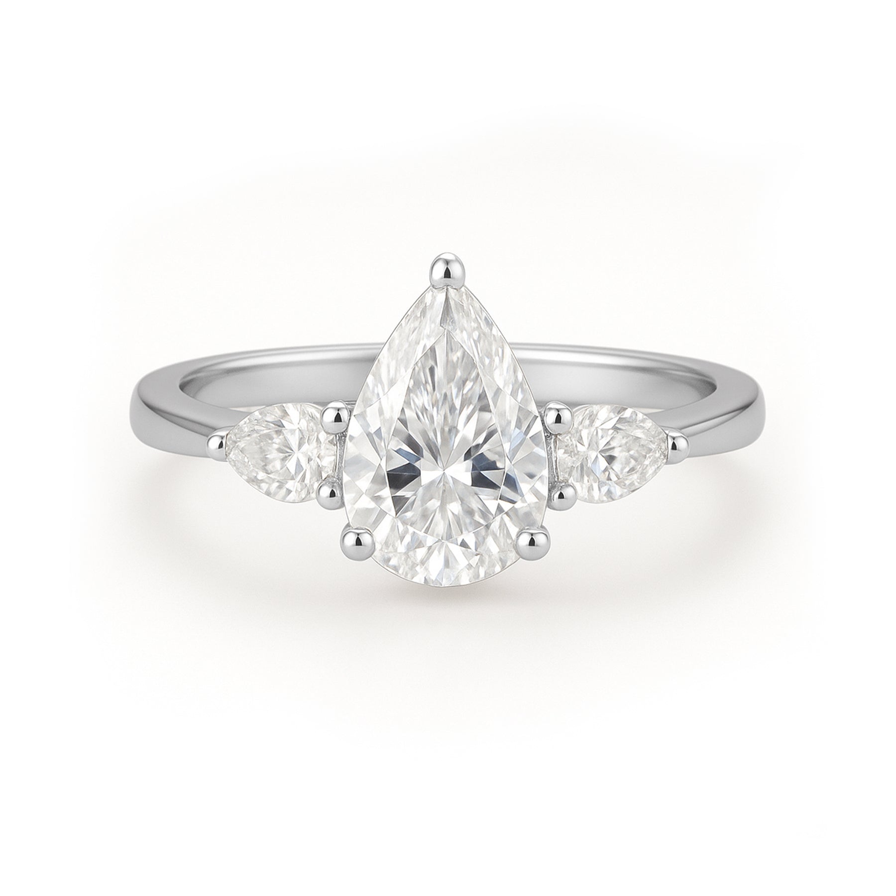 1.10 Ct Pear Moissanite Three-Stone Engagement Ring